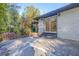 Concrete patio with brick steps and sliding glass door access at 2173 Cloverdale Se Dr, Atlanta, GA 30316