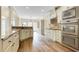 Open concept kitchen with granite counters and high-end appliances at 490 Revenna Trl, Fayetteville, GA 30214