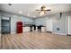 Basement kitchen with white cabinets and red refrigerator at 585 Stoneglen Chase Sw, Atlanta, GA 30331