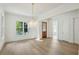 Elegant dining room with hardwood floors and chandelier at 114 Terrace Ne Dr, Atlanta, GA 30305