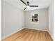 Light and airy bedroom with wood-look floors and ceiling fan at 2089 Bluffton Way, Decatur, GA 30035