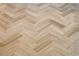 Herringbone-patterned wood-look tile flooring at 116 Terrace Dr, Atlanta, GA 30305