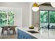 Modern kitchen island with sink and breakfast bar at 116 Terrace Dr, Atlanta, GA 30305