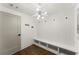 Bright mudroom with built-in bench, storage, and vertical shiplap feature wall at 726 Edgewood Ne Ave # 20, Atlanta, GA 30307