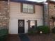 Two-story townhome with brick and siding at 738 Garden View Dr, Stone Mountain, GA 30083