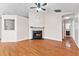 Hardwood floor living room with fireplace and open floor plan at 942 Maple Leaf Rdg, Jonesboro, GA 30238