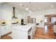 Modern kitchen with white cabinets, stainless steel appliances, and an island at 405 Laurel Spring Ct, Canton, GA 30114