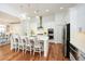 Modern kitchen with white cabinets, stainless steel appliances, and an island at 405 Laurel Spring Ct, Canton, GA 30114