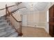 Elegant entryway with staircase and chandelier at 4116 River Cliff Chase Se, Marietta, GA 30067