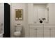 Bright bathroom with double vanity and shower/tub combo at 2310 Treaty Ln, Douglasville, GA 30135