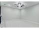 Bright bonus room with ceiling fan, ideal for various uses at 101 Forsyth Park Ln, Woodstock, GA 30188