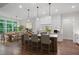 Bright kitchen with island, stainless steel appliances, and hardwood floors at 101 Forsyth Park Ln, Woodstock, GA 30188