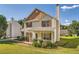 Two-story house with brown accents and a landscaped yard at 982 Hunt Rd, Jonesboro, GA 30236