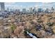 Aerial view of neighborhood with city skyline in distance at 320 3Rd Ne St # 1, Atlanta, GA 30308