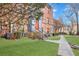 Brick building exterior with grassy yard and walkway at 320 3Rd Ne St # 1, Atlanta, GA 30308