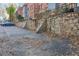 Parking area with stone retaining wall at 320 3Rd Ne St # 1, Atlanta, GA 30308