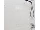 White tiled shower with handheld shower head at 320 3Rd Ne St # 1, Atlanta, GA 30308