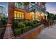 Elegant brick building exterior with landscaped grounds at 206 11Th St # 302, Atlanta, GA 30309