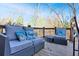 Deck with comfortable seating and scenic wooded backdrop at 310 Melissa Way, Atlanta, GA 30349