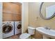 Convenient laundry room with washer, dryer, and storage at 3135 Washington Rd, Atlanta, GA 30344