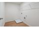 Laundry room with vinyl flooring and shelving at 678 Smokey Quartz Way, Kennesaw, GA 30144