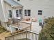 Spacious back deck with stairs, offering ample outdoor space at 25 Grange Ct, Sharpsburg, GA 30277