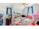 Playful ' room, colorful rug, and plenty of toys at 25 Grange Ct, Sharpsburg, GA 30277