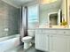 Bright bathroom with a shower/tub combo and white vanity at 787 Belrose Dr, Smyrna, GA 30080