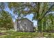 Gray house exterior surrounded by trees at 360 Peyton Sw Rd, Atlanta, GA 30311