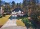 Two story house with driveway and basketball goal at 4844 Dartford Dr, Powder Springs, GA 30127