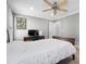 Spacious bedroom with a desk and ceiling fan at 4844 Dartford Dr, Powder Springs, GA 30127