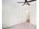 Bedroom with two closets and ceiling fan at 125 Village Pkwy, Woodstock, GA 30188