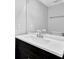 Bathroom boasts a modern vanity with a white countertop at 731 Victoria Sw Pl, Atlanta, GA 30310