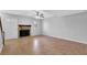 Bright living room with tile floors, fireplace, and ceiling fan at 731 Victoria Sw Pl, Atlanta, GA 30310