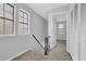 Upstairs hall with carpet, linen closets and a bedroom at 731 Victoria Sw Pl, Atlanta, GA 30310