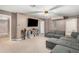 Finished basement Gathering room with sectional sofa at 2213 Jessowen Se Way, Conyers, GA 30013