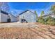 Gray house with a small porch and side yard at 2506 Maple St, East Point, GA 30344