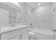 Bathroom with white vanity, marble shower, and bathtub at 4806 Forest Trl, Douglasville, GA 30135