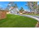 Two-story house with gray siding, brick accents, and a two-car garage at 4806 Forest Trl, Douglasville, GA 30135