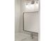 Vanity with a modern mirror and light fixture at 2333 Mason Dr # D26, Atlanta, GA 30316