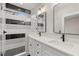 Modern bathroom with double vanity and black and white tile at 2333 Mason Dr # D26, Atlanta, GA 30316