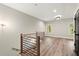 Bright loft area with hardwood floors and a modern railing at 2333 Mason Dr # D26, Atlanta, GA 30316