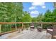 Spacious deck with seating area and wooded views at 1216 Bradford Park Ln, Auburn, GA 30011