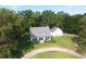 Aerial view of a charming two-story home with a separate building at 788 S Hwy 11 S, Social Circle, GA 30025