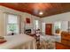 Spacious bedroom with fireplace and wood ceiling at 788 S Hwy 11 S, Social Circle, GA 30025