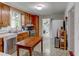 Eat-in kitchen with wood cabinets and island at 788 S Hwy 11 S, Social Circle, GA 30025