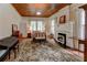 Large bedroom with hardwood floors, fireplace, and plenty of natural light at 788 S Hwy 11 S, Social Circle, GA 30025