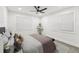 Bright bedroom with a queen bed, ceiling fan, and large windows at 1288 Almont Sw Dr, Atlanta, GA 30310