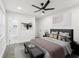 Spacious bedroom with ensuite bathroom and ceiling fan at 1288 Almont Sw Dr, Atlanta, GA 30310