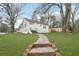 Cute bungalow with a landscaped lawn and walkway at 1288 Almont Sw Dr, Atlanta, GA 30310